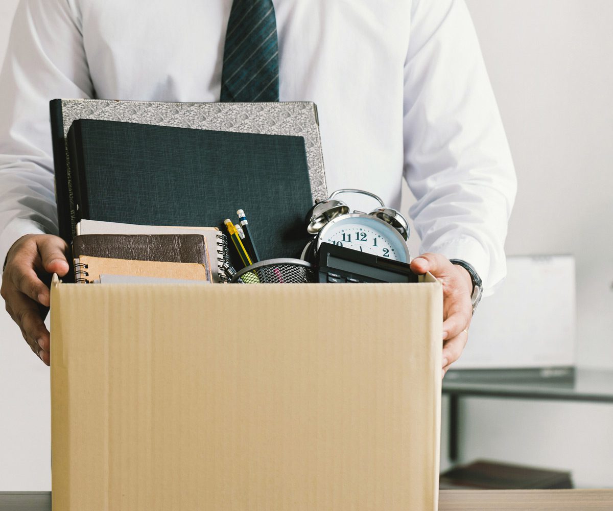 Employee-packing-box-due-to-reductions-in-workforce-in-Nevada