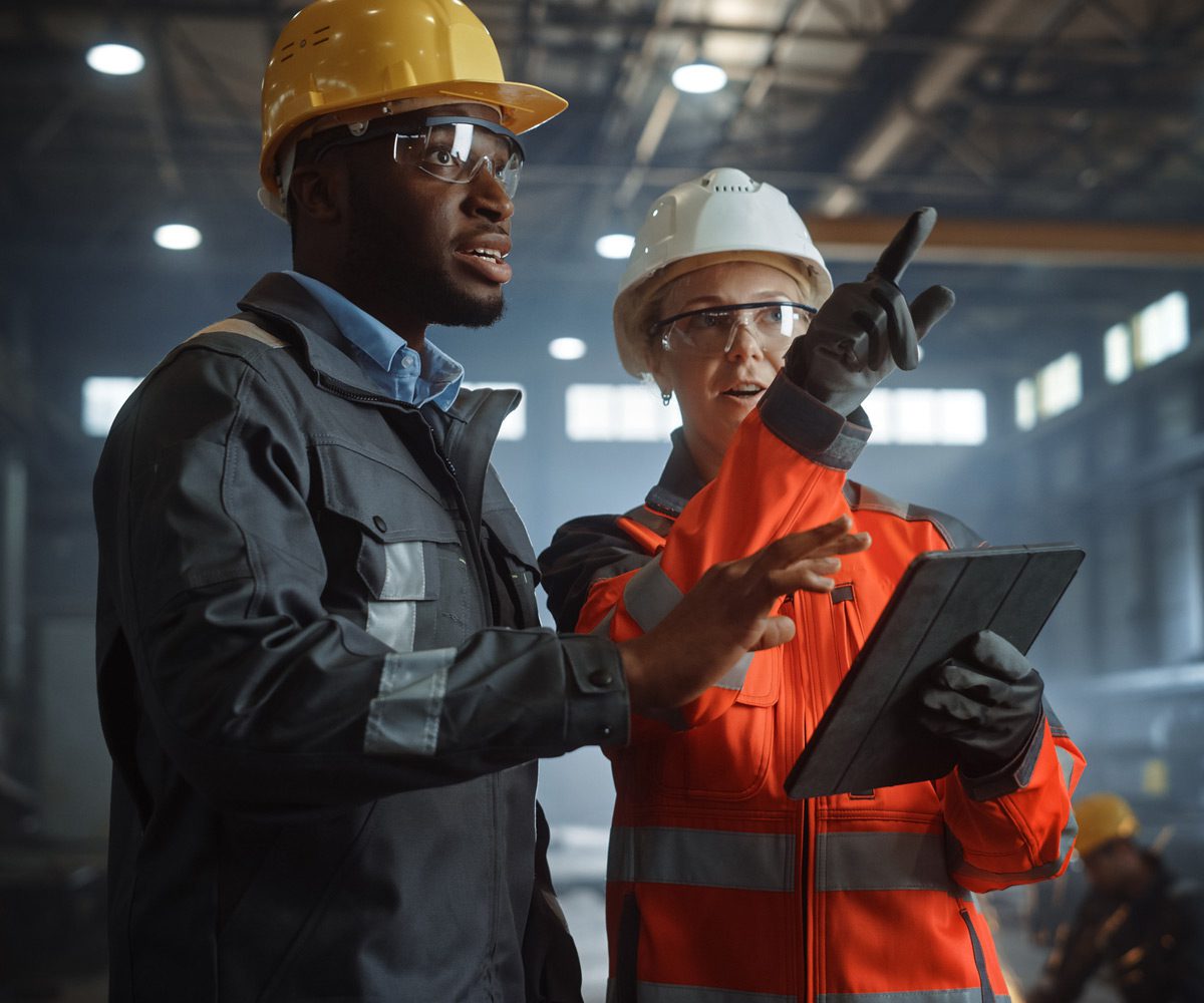 Two-workers-conducting-safety-inspection-to-prevent-OSHA-violation
