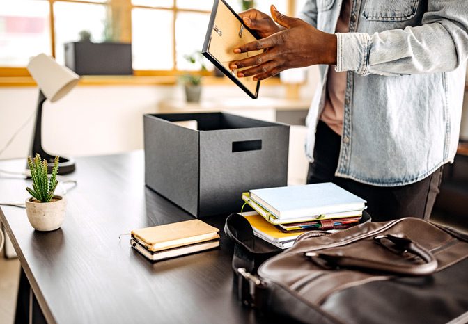 Employee-packing-up-belongings-due-to-constructive-discharge Employee-packing-up-belongings-due-to-constructive-discharge