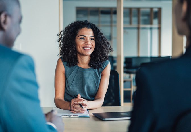 Female-employee-having-discussion-with-HR-about-restrictive-covenants Female-employee-having-discussion-with-HR-about-restrictive-covenants