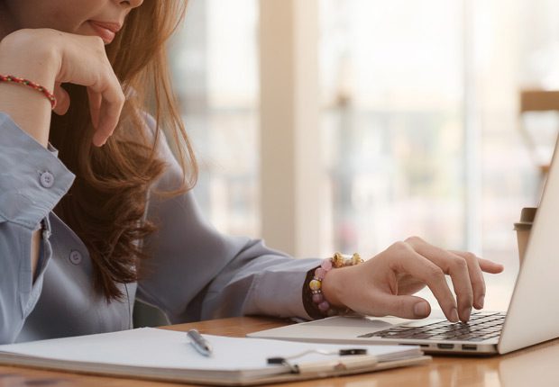 Female-employee-reviewing-her-employee-benefits-package Female-employee-reviewing-her-employee-benefits-package