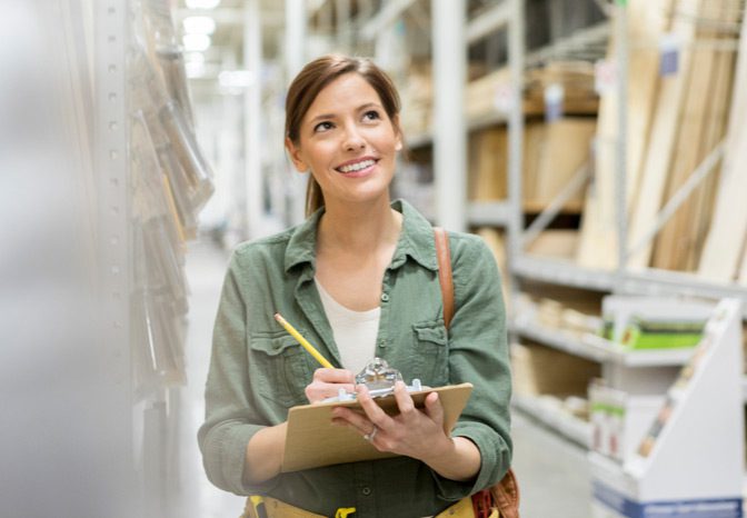 Female-employee-working-in-a-home-improvement-store Female-employee-working-in-a-home-improvement-store