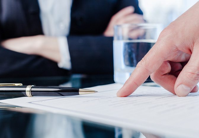 Finger-pointing-at-document-in-breach-of-contract-dispute Finger-pointing-at-document-in-breach-of-contract-dispute