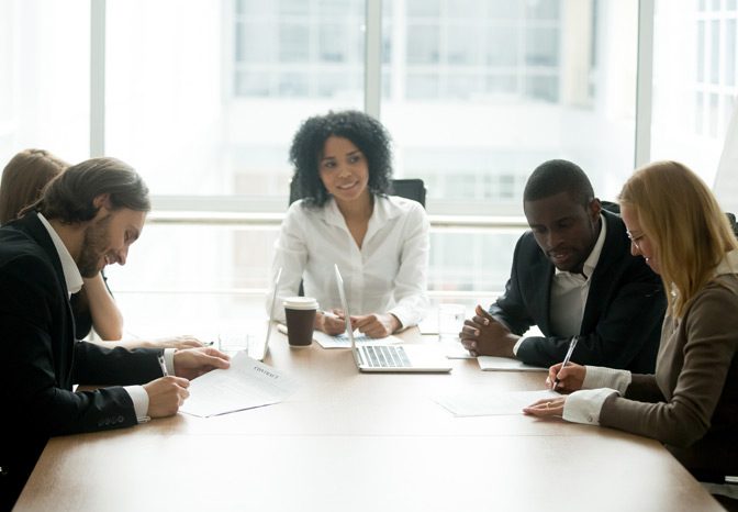 Group-of-individuals-engaging-in-traditional-labor-negotiations Group-of-individuals-engaging-in-traditional-labor-negotiations