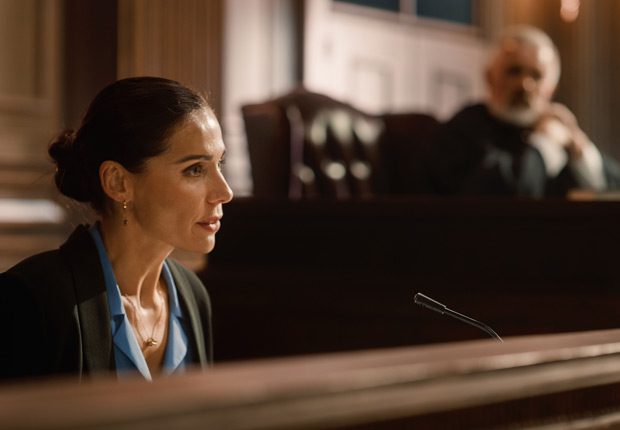 Woman-testifying-about-nonsexual-harassment-in-the-workplace Woman-testifying-about-nonsexual-harassment-in-the-workplace