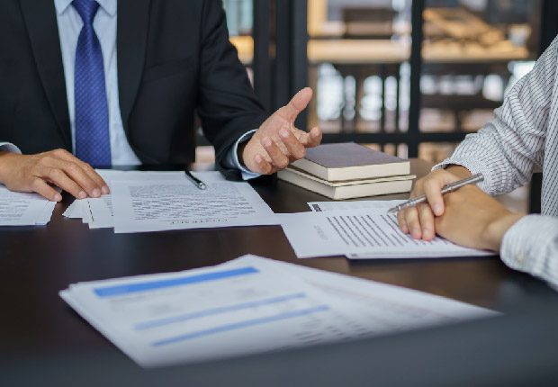 lawyer-going-over-notes-for-a-class-action-suit